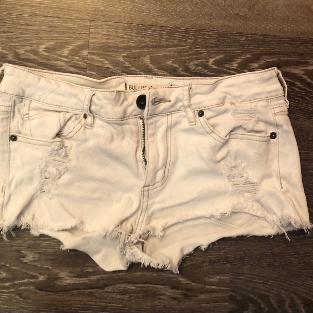 white, ripped jean shorts